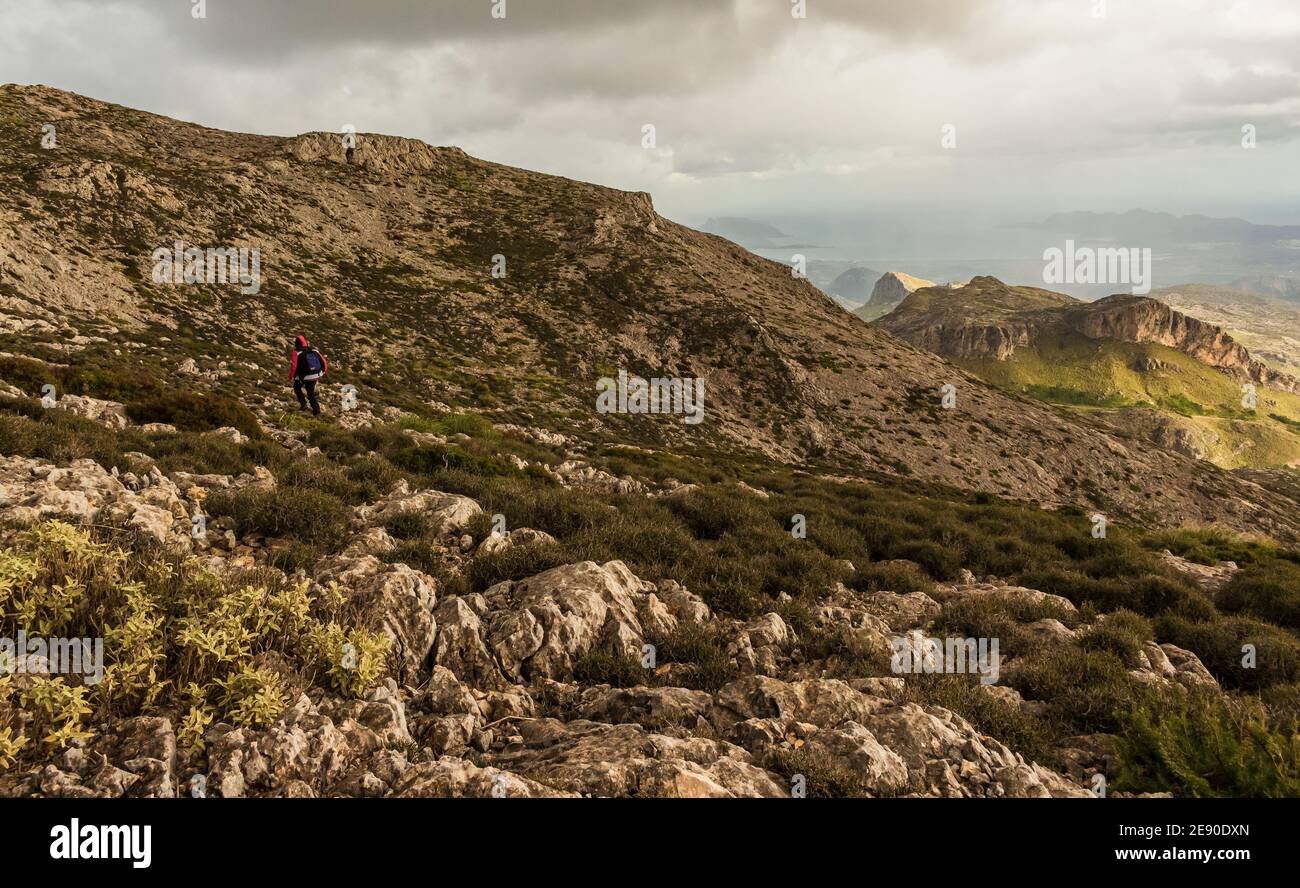 Mountain hiking below cloudy sky. Escorca. Serra de Tramuntana. Mallorca Island. Spain. Stock Photo