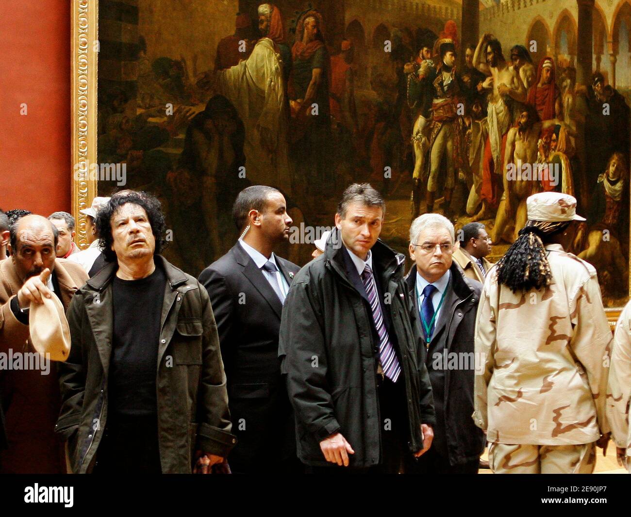 Libyan leader Moammar Gadhafi looks at paintings as he visits the Louvre museum during his controversial six-day visit in Paris, France on December 13, 2007. Photo by Chesnot-Stevens/Pool/ABACAPRESS.COM Stock Photo