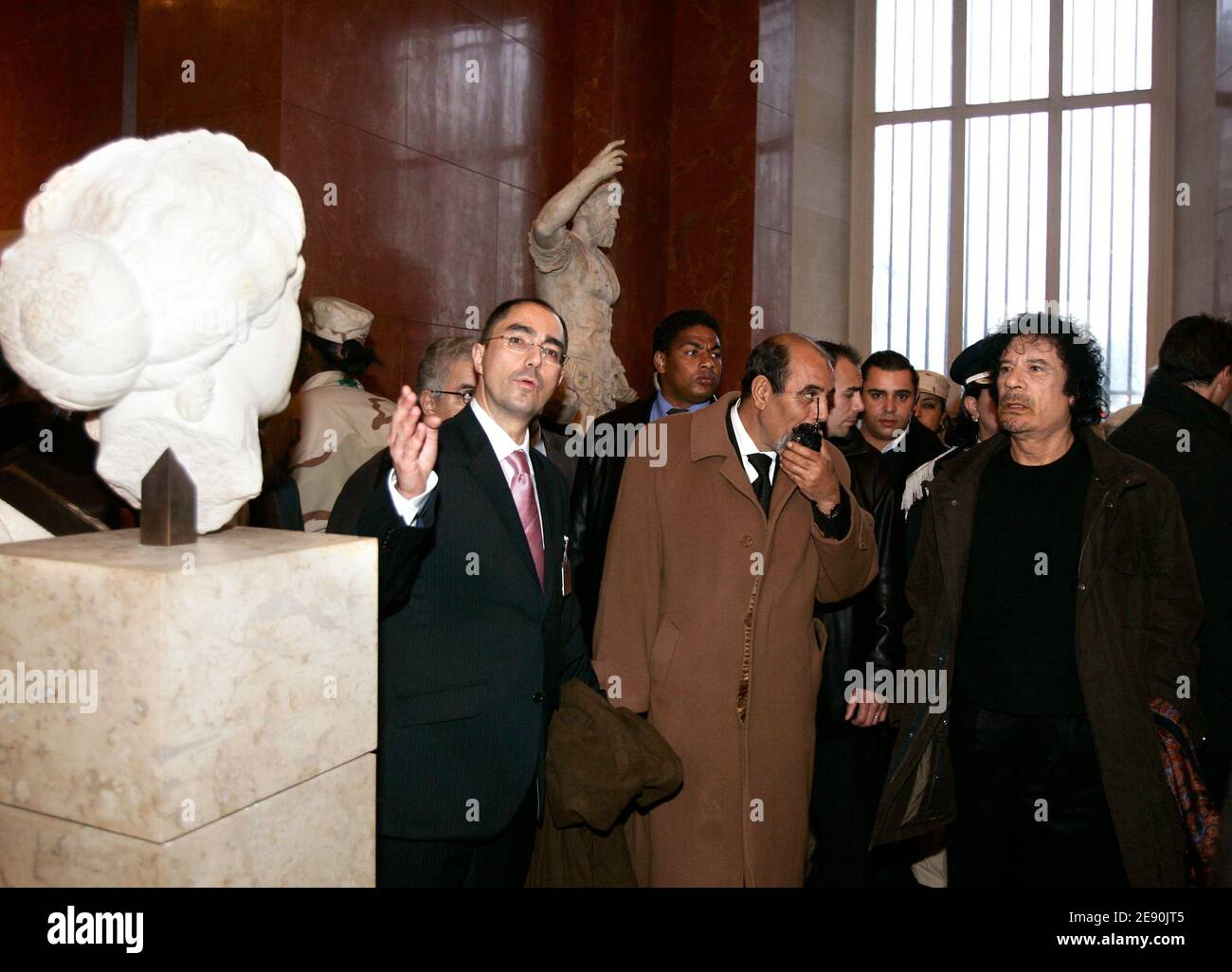 Libyan leader Moammar Gadhafi looks at statues as he visits the Louvre museum during his controversial six-day visit in Paris, France on December 13, 2007. Photo by Chesnot-Stevens/Pool/ABACAPRESS.COM Stock Photo