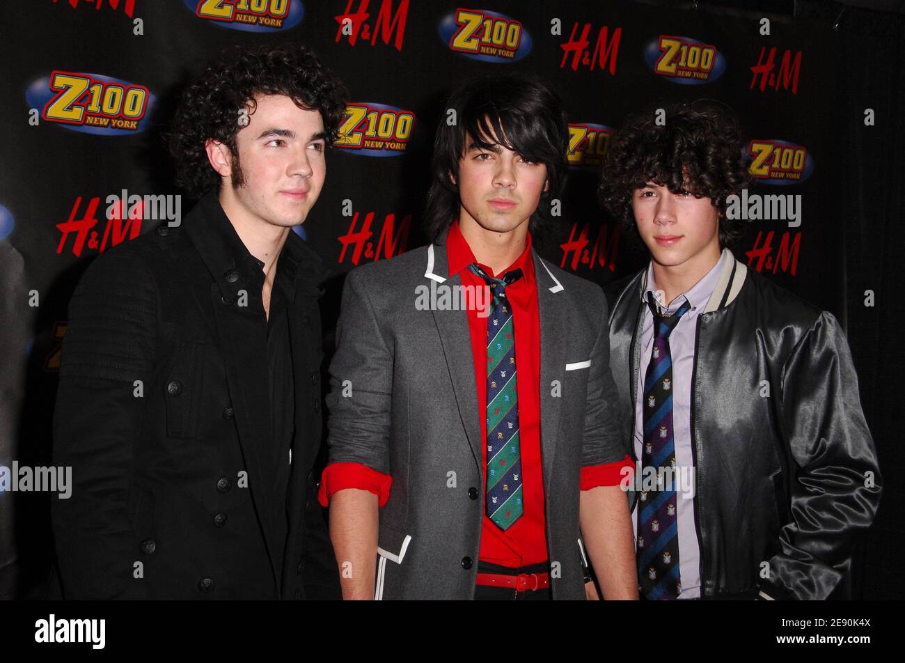 (L-R) Musicians Nick Jonas, Joe Jonas and Kevin Jonas of 'Jonas' pose for a photo in the press room during Z100's Jingle Ball 2007, held at the Madison Square Garden in New York City, NY, USA on December 14, 2007. Photo by Gregorio Binuya/ABACAPRESS.COM Stock Photo