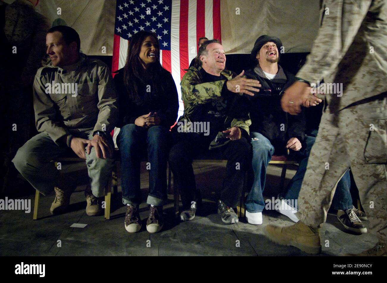 Seven-time Tour de France champion Lance Armstrong, Miss USA Rachel Smith, comedian Robin Williams and musician Kid Rock greet U.S. Marines after a performance at Al Taqqadum, Iraq, on December 18, 2007. Photo by DOD via ABACAPRESS.COM Stock Photo