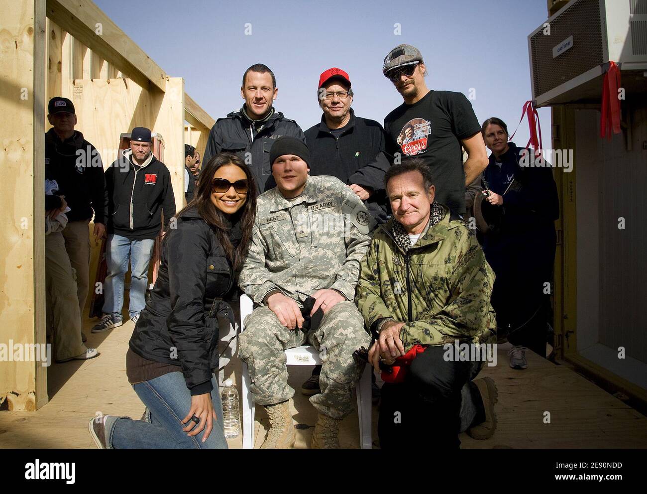 Seven time Tour de France champion Lance Armstrong, Comedian Lewis Black, musician Kid Rock, Miss USA Rachel Smith and comedian Robin Williams pose for a photo with wounded warrior Jordan West of Chicago during the 2007 USO Holiday Tour stop at Logistics Support Area Anaconda in Balad, Iraq, on December 20, 2007. Photo by DOD via ABACAPRESS.COM Stock Photo