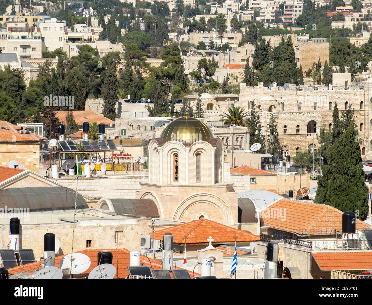 Old Jerusalem cityscape with cypress trees Stock Photo