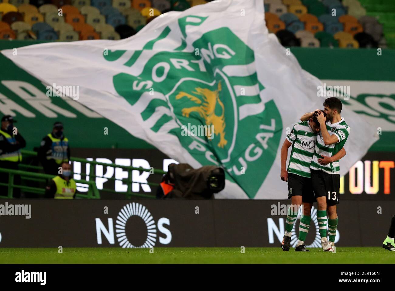 Lisbon, Portugal. 2nd Feb, 2021. Matheus Nunes of Sporting CP (L) celebrates with Luis Neto during the Portuguese League football match between Sporting CP and SL Benfica at Jose Alvalade stadium in Lisbon, Portugal on February 1, 2021. Credit: Pedro Fiuza/ZUMA Wire/Alamy Live News Stock Photo