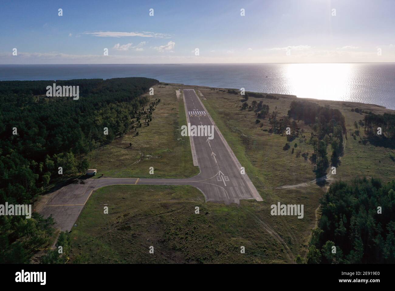 Small epmty airfield airport near sea in resort, aerial Stock Photo