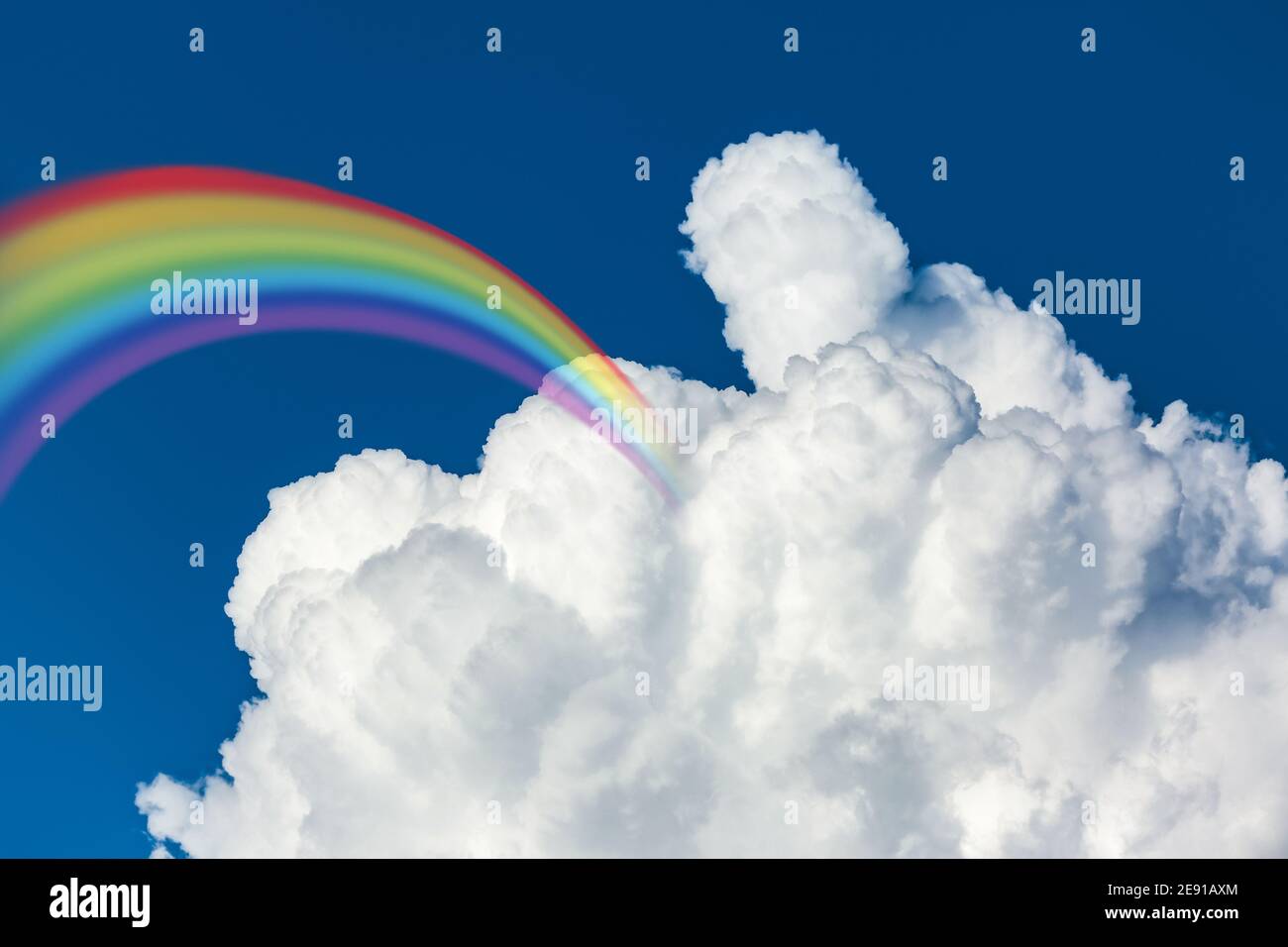 Beautiful view of blue sky with clouds and rainbow Stock Photo - Alamy