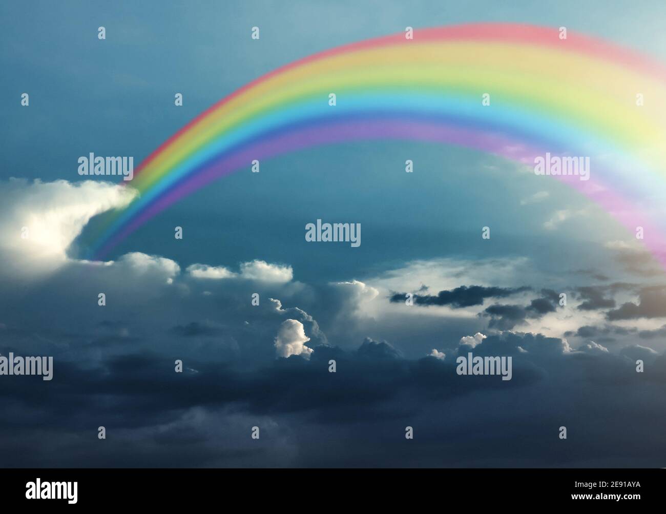 Beautiful view of blue sky with clouds and rainbow Stock Photo - Alamy