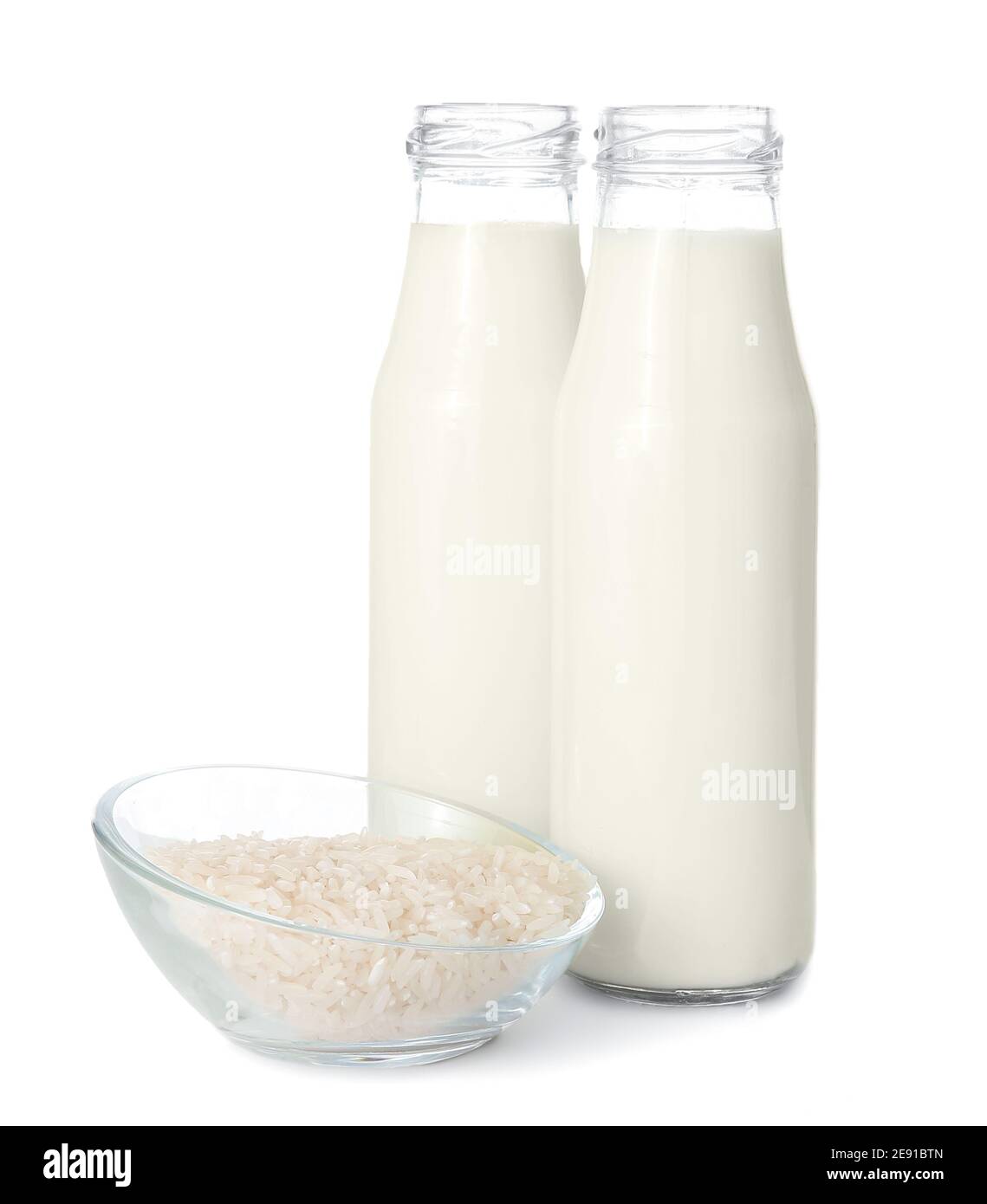 Bottles of rice milk on white background Stock Photo Alamy
