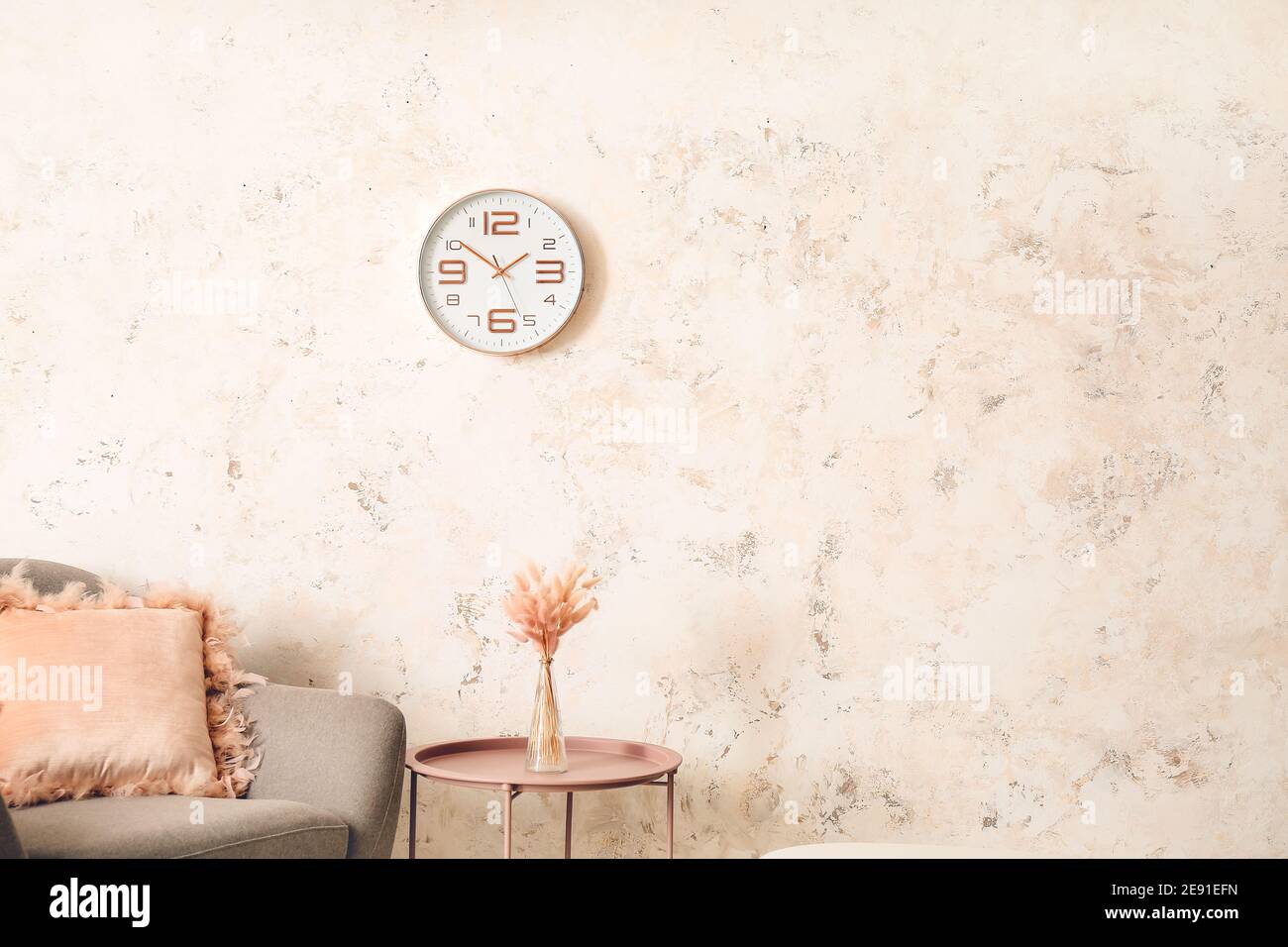 Interior of modern room with armchair and table Stock Photo - Alamy