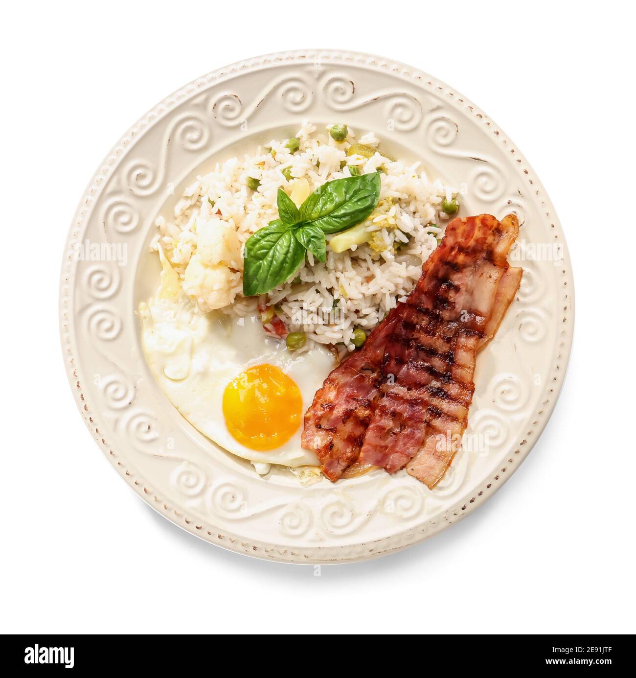 Plate with tasty egg, bacon and rice on white background Stock Photo ...