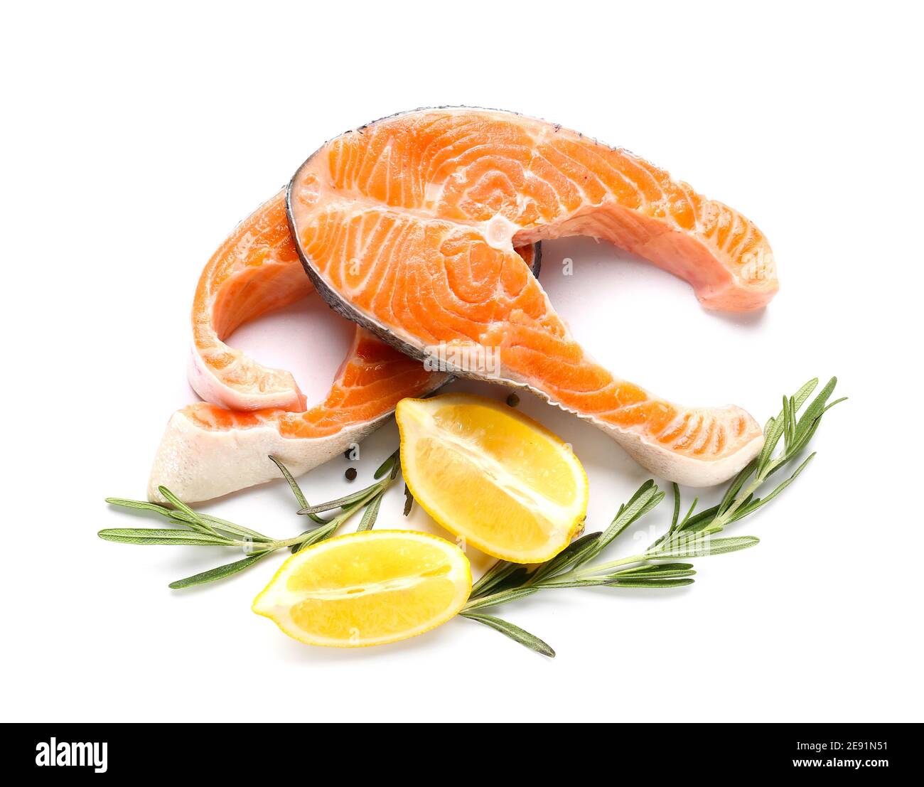 Raw salmon steaks and lemon on white background Stock Photo Alamy