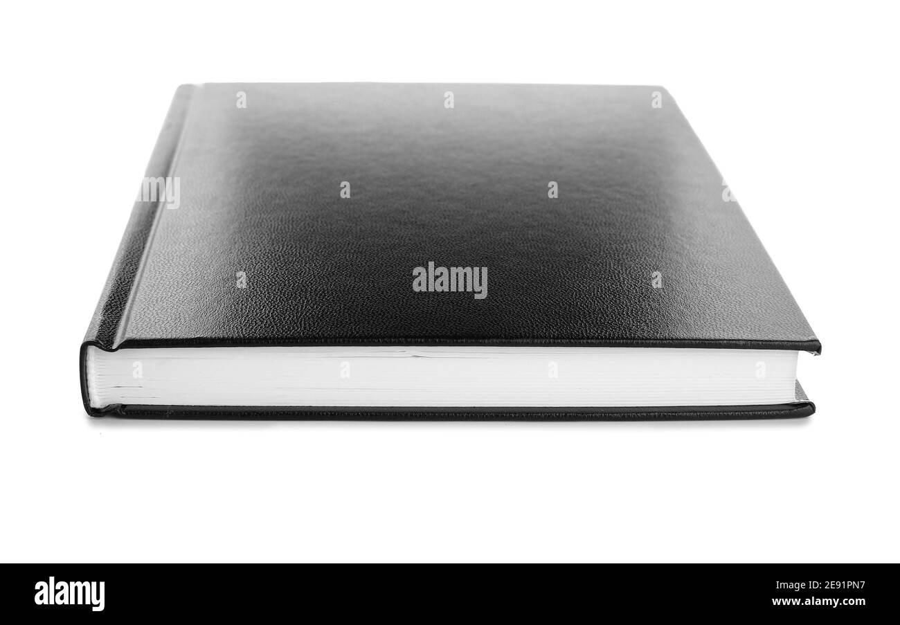 Book with black cover on white background Stock Photo - Alamy