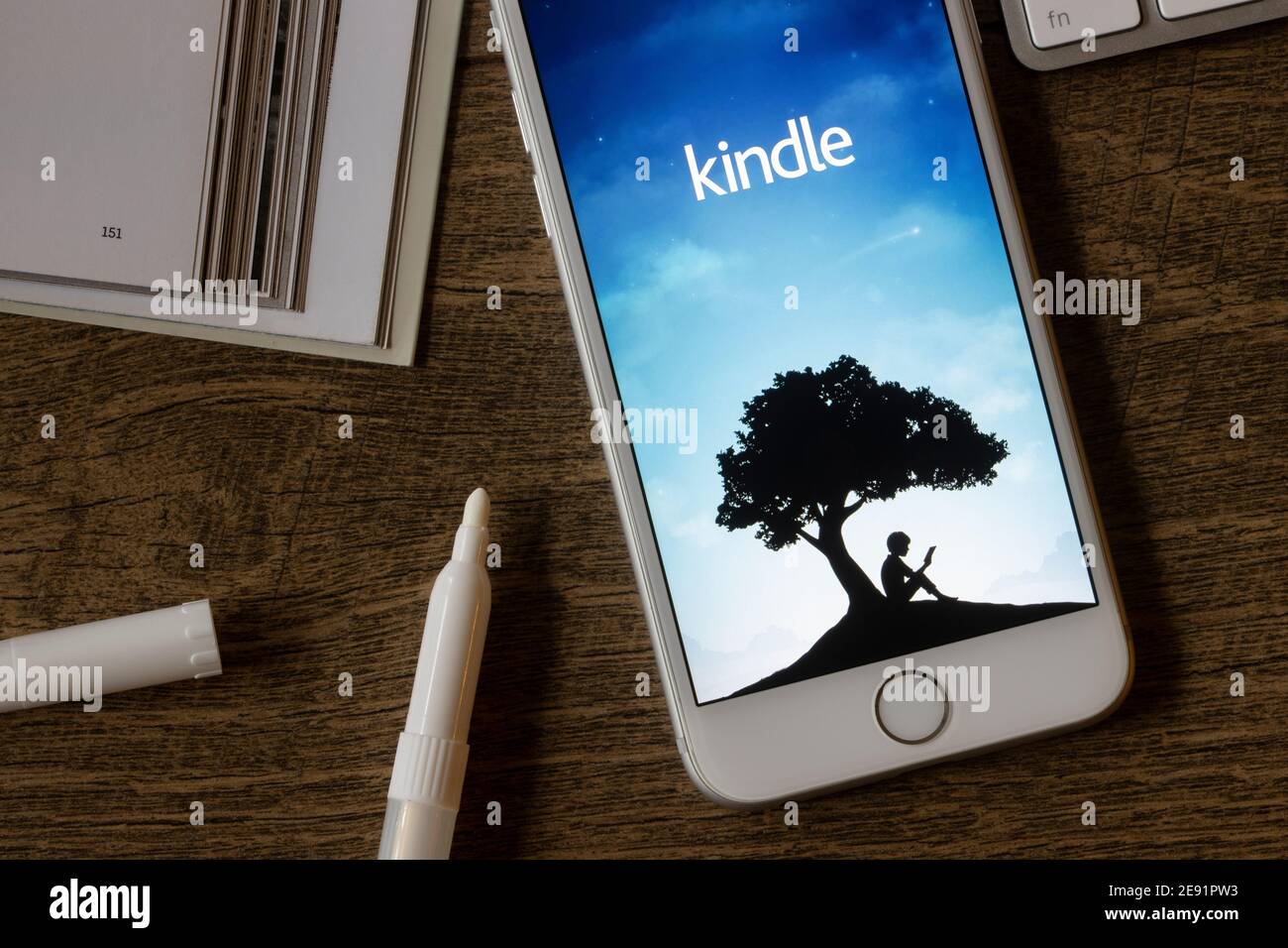 The Amazon Kindle mobile app welcome page is seen on an iPhone on February 1, 2021. The application gives users the ability to read eBooks on the go. Stock Photo