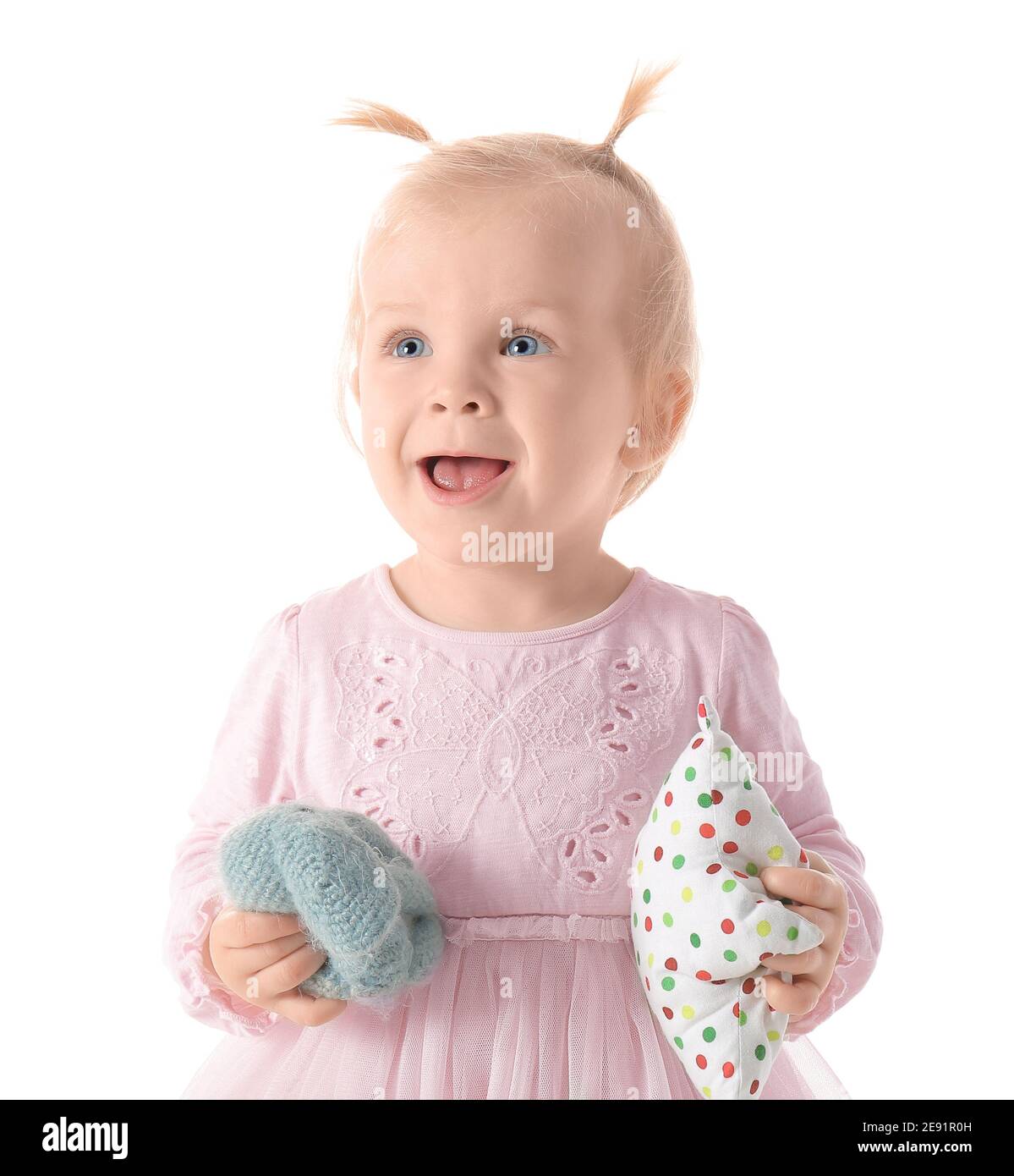 Portrait of happy little baby girl with toys on white background Stock ...