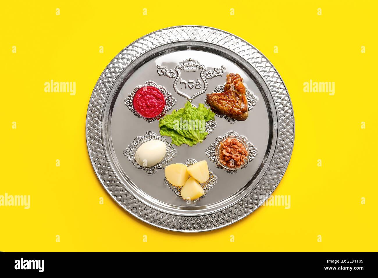 Passover Seder plate with traditional food on color background Stock ...