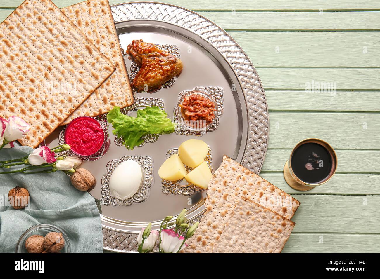 Passover Seder plate with traditional food on table Stock Photo - Alamy