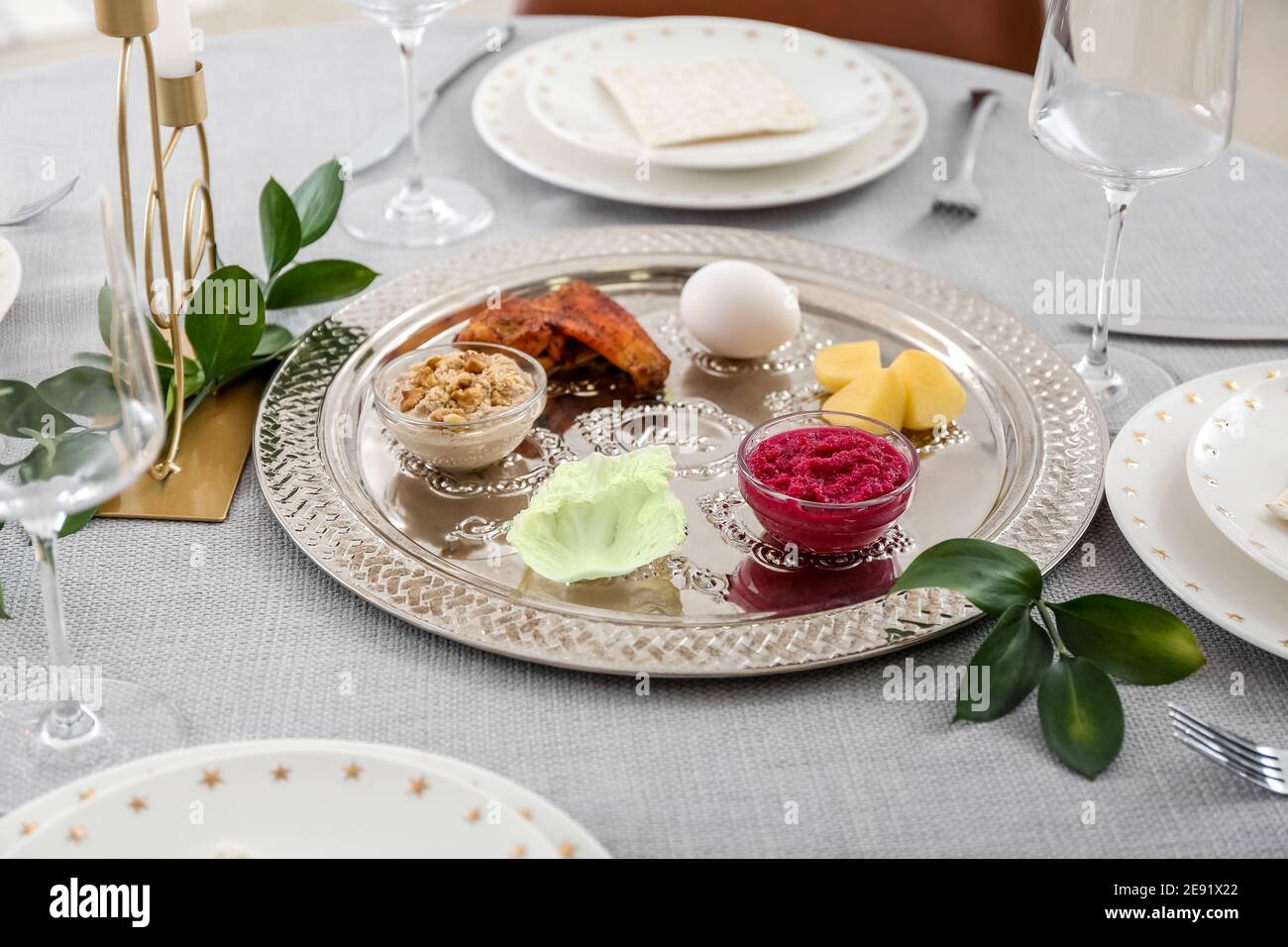 Passover Seder plate with traditional food on served table Stock Photo ...
