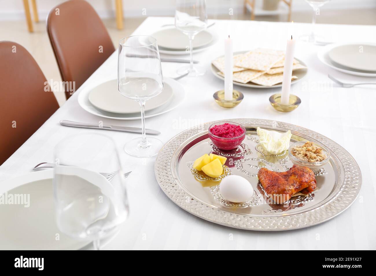 Passover Seder plate with traditional food on served table Stock Photo ...