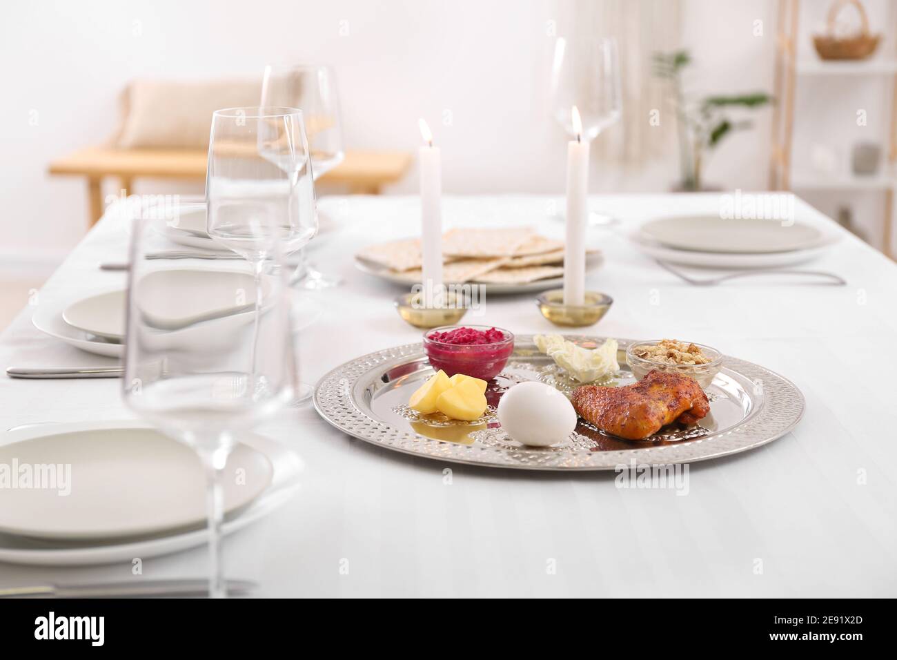 Passover Seder plate with traditional food on served table Stock Photo ...