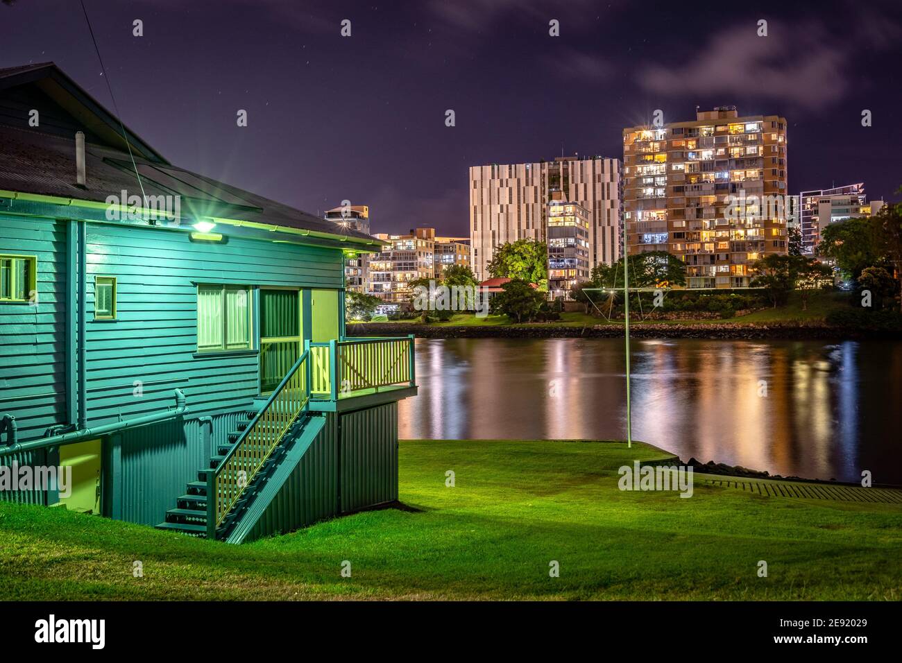 Brisbane, Australia - Historical South Brisbane Sailing Club building with modern apartments in the background Stock Photo