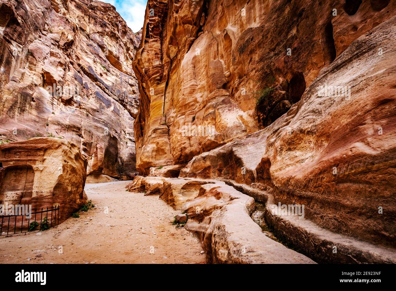 The Siq, a miracle narrow stone gallery in mysterious Petra, Jordan Stock Photo
