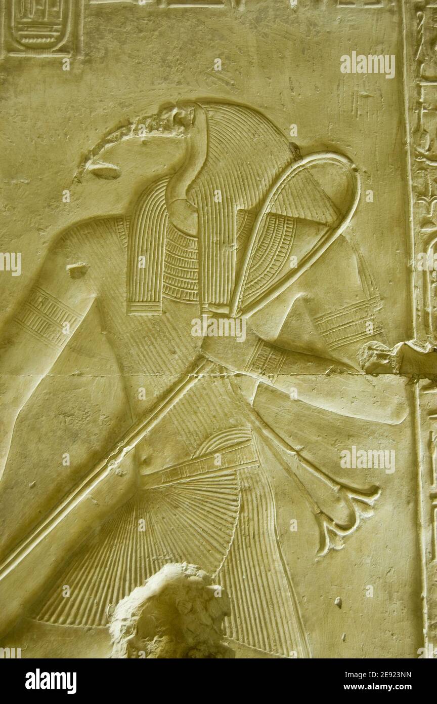 Ancient Egyptian bas relief sculpture of the vulture headed god Thoth. Inner wall at the Temple to Osiris at Abydos, near El Balyana, Egypt. Ancient s Stock Photo