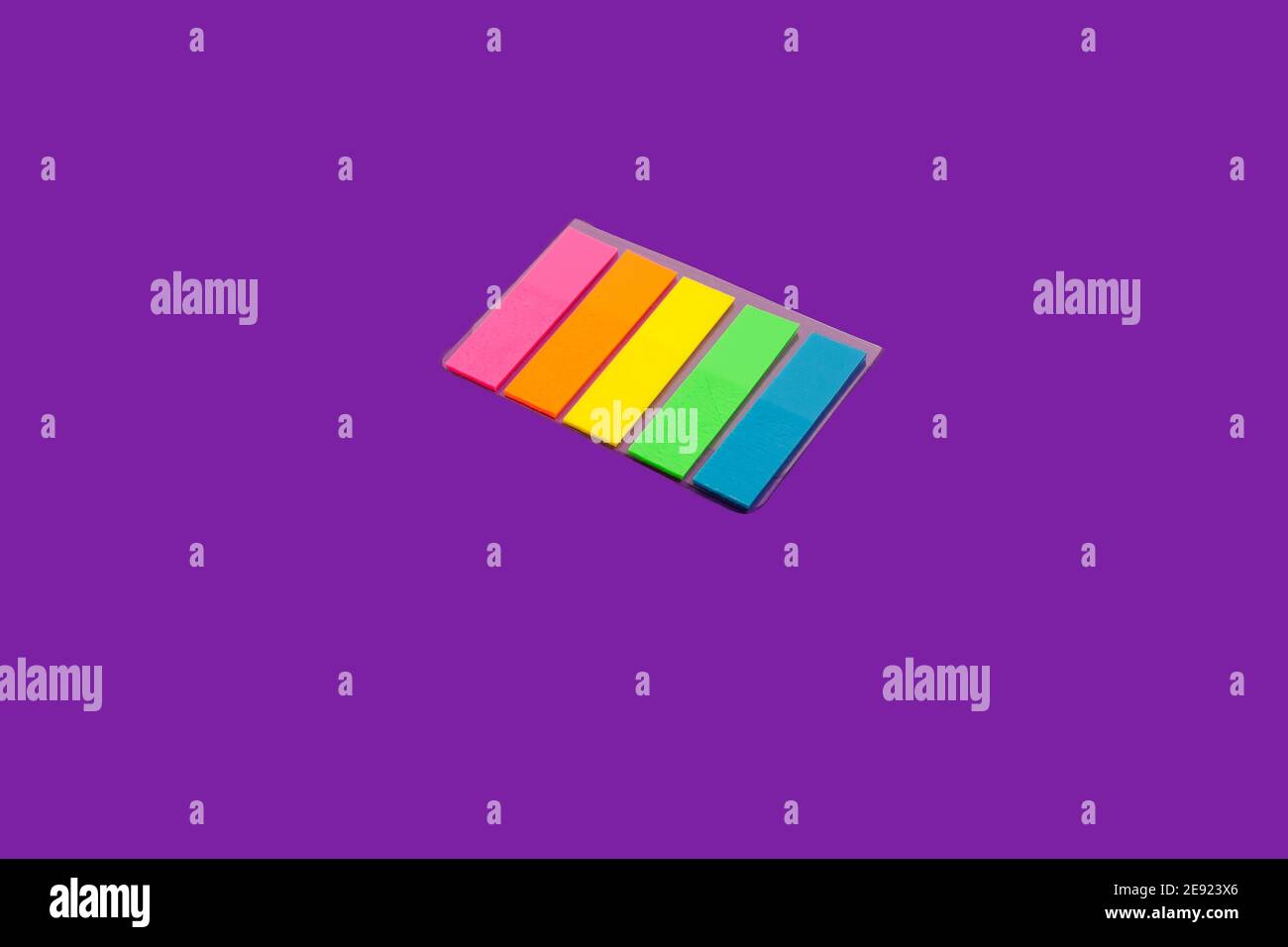 set of sticky notes on a purple surface Stock Photo