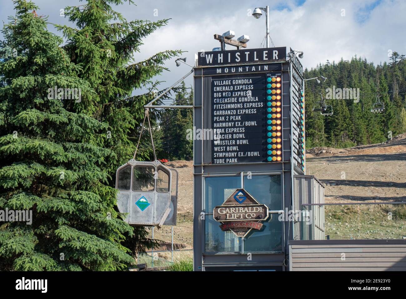 Whistler, Canada - July 5,2020: View of Whistler Village Gondola with pine trees in the background Stock Photo