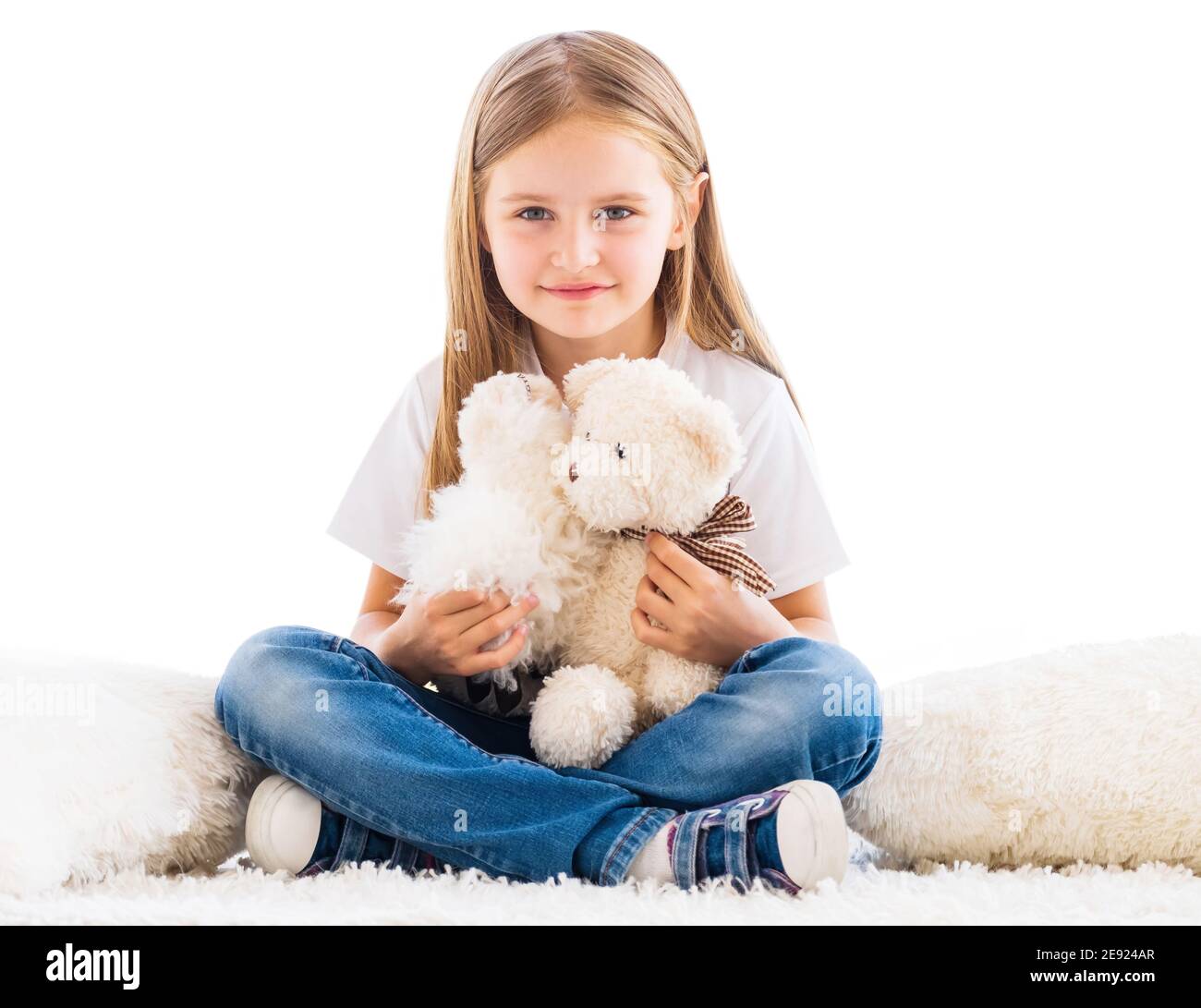 Nice little girl playing toys isolated on white Stock Photo Alamy