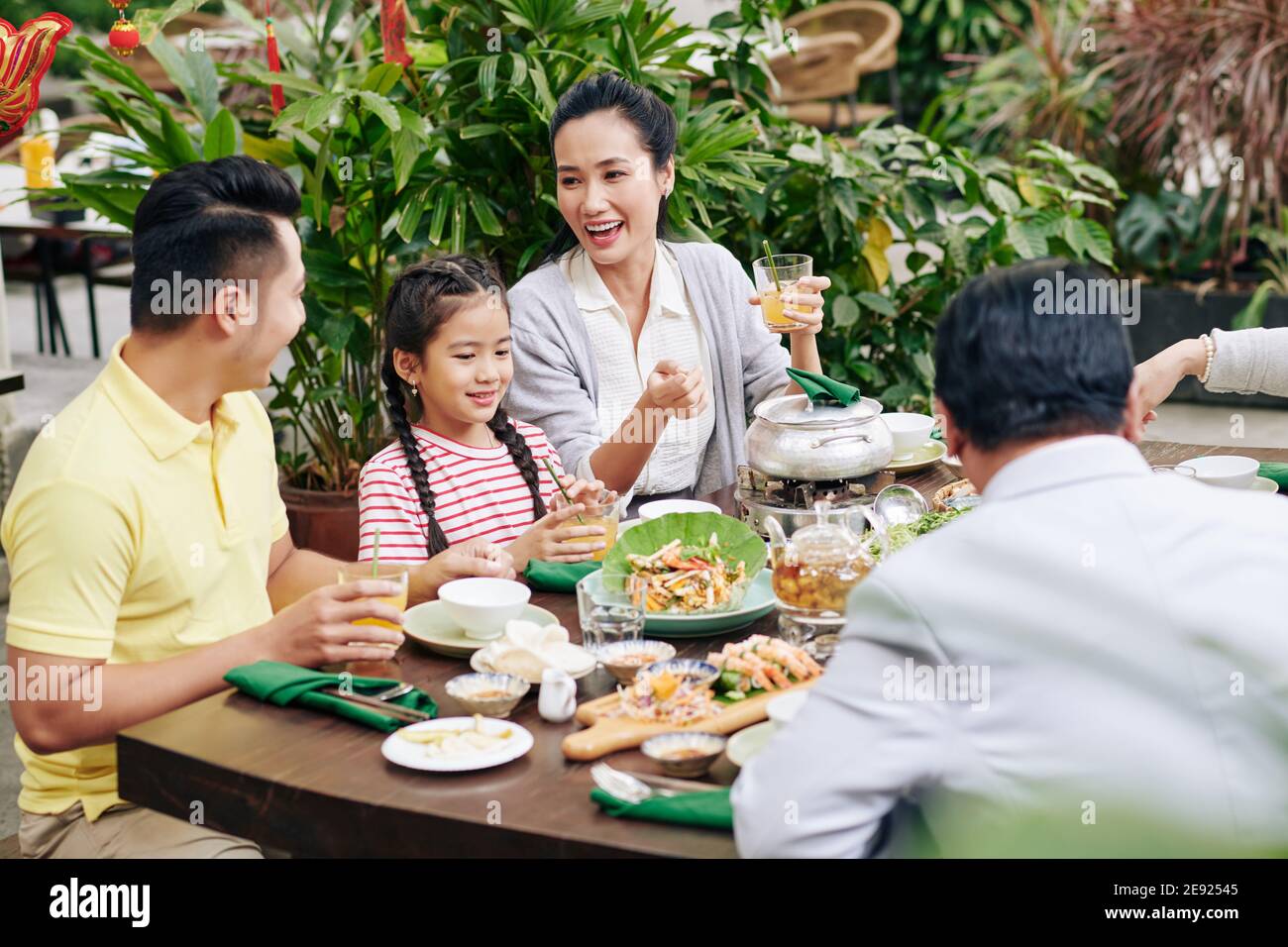 Celebrating New Year with family Stock Photo - Alamy