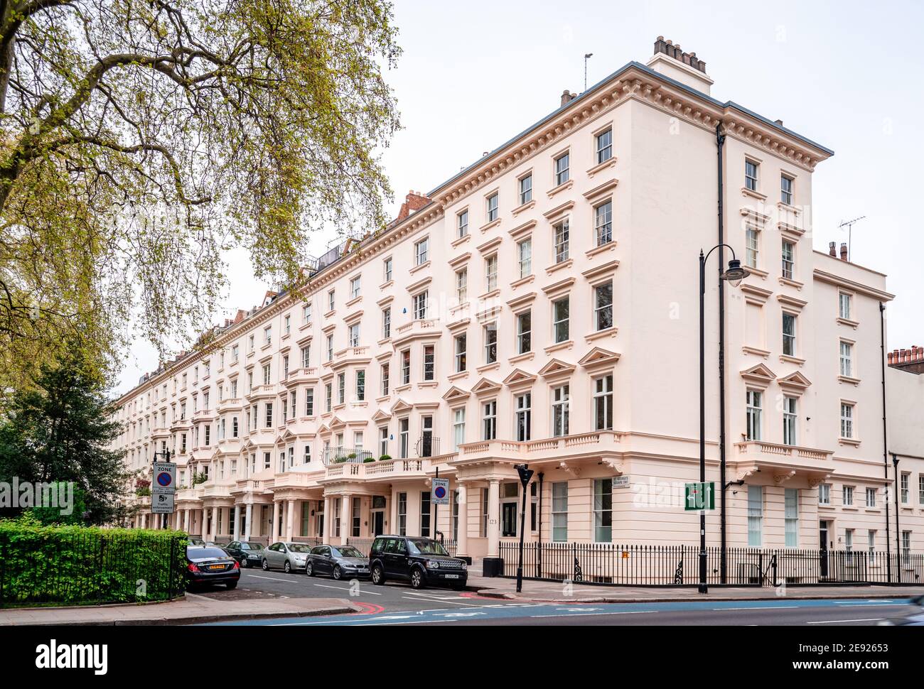 View of the junction of Grosvenor Rd and St George's Square, with tall white old terraced houses. Pimlico, City of Westminster, London, UK. Stock Photo