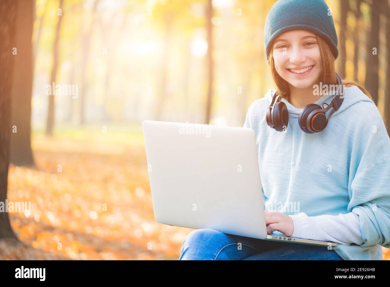 Happy teen girl in headphones hi-res stock photography and images - Alamy