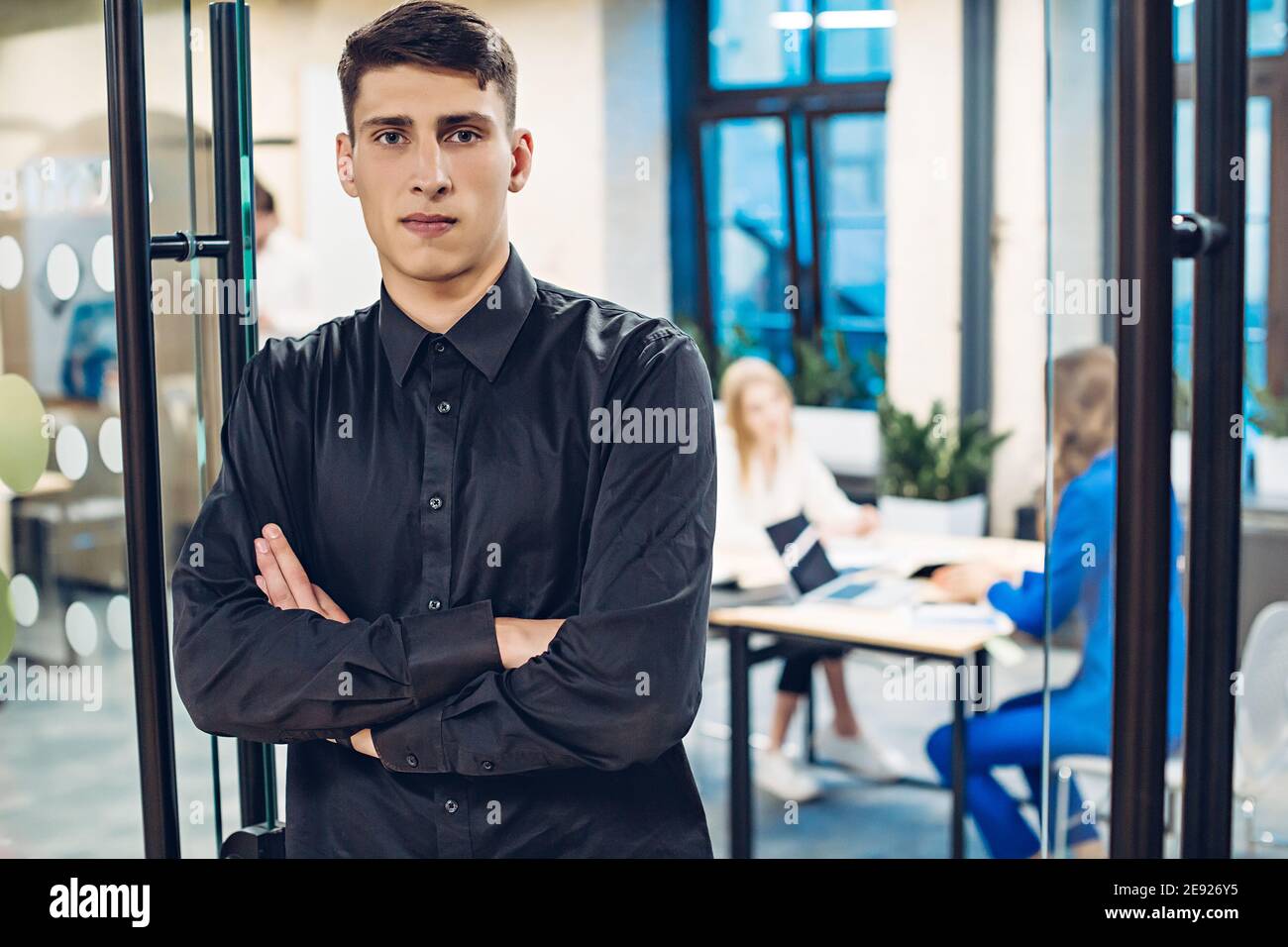 Company manager crossed arms hi-res stock photography and images - Alamy