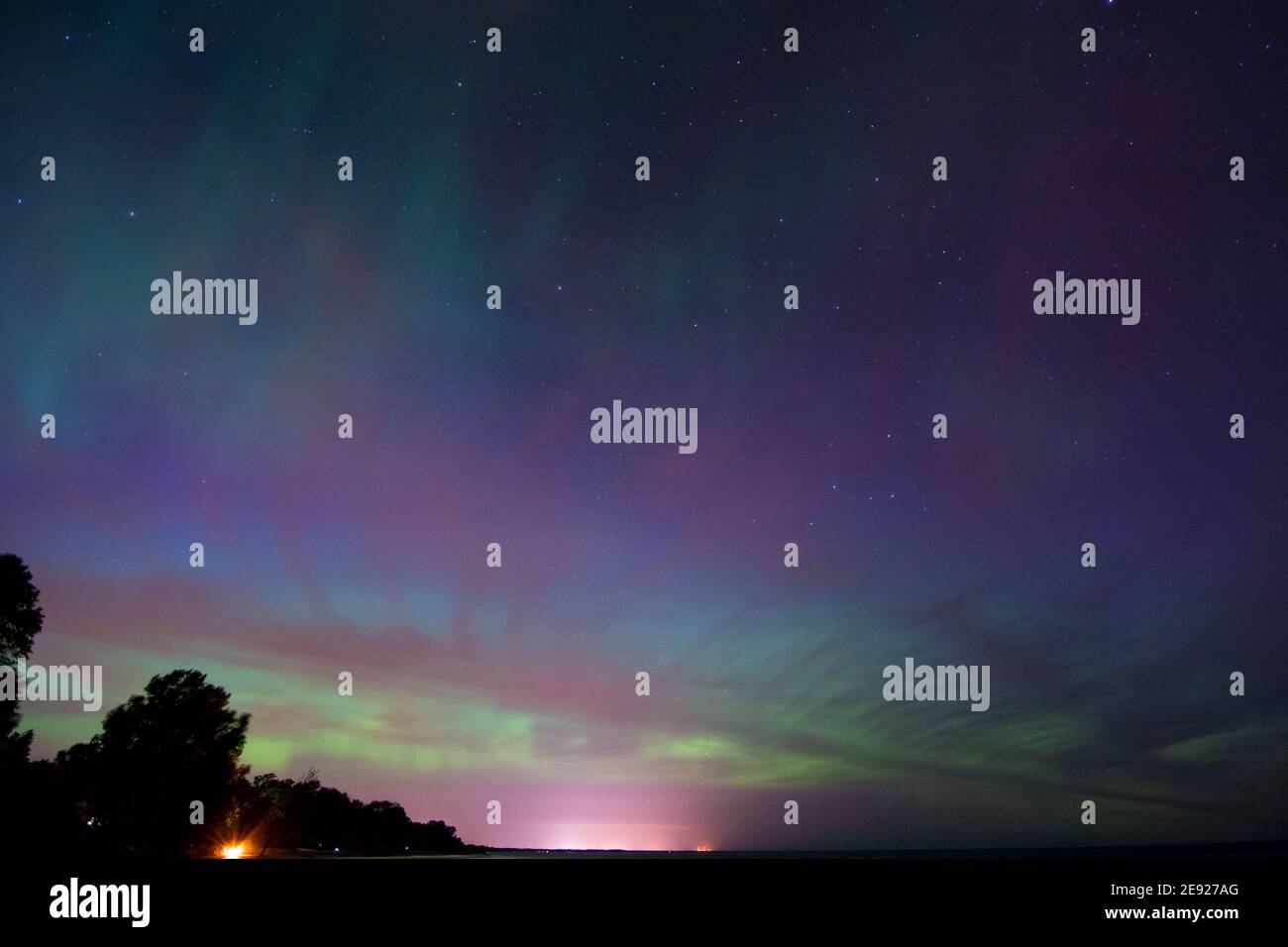 Northern Lights, Aurora Borealis displaying over Lake Michigan Stock