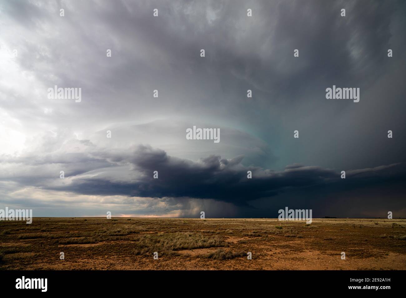 Stormy sky and threatening clouds from a supercell thunderstorm on the horizon near Roswell, New Mexico Stock Photo