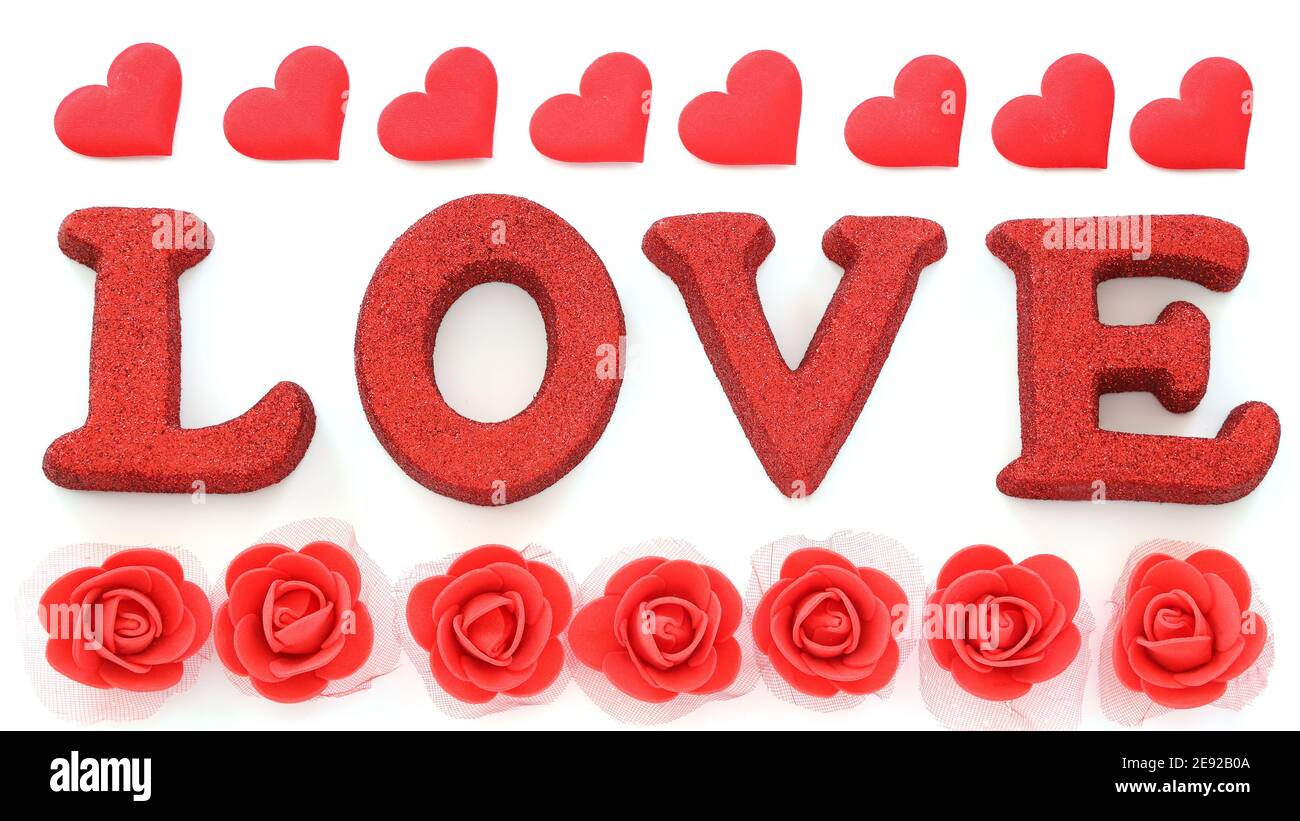 Red sign Love and heart, rose shapes on white background . Valentine ...