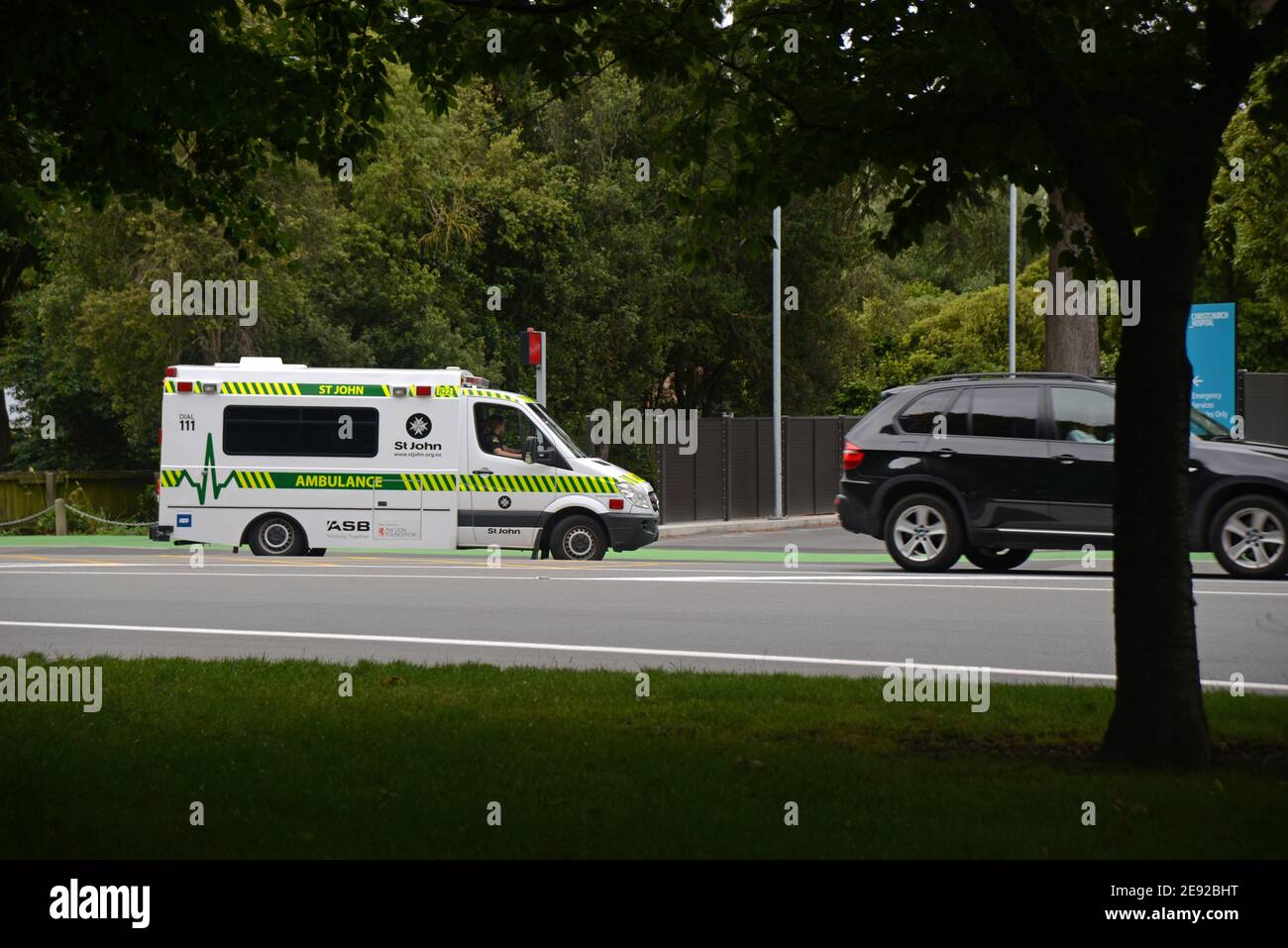 CHRISTCHURCH, NEW ZEALAND, DECEMBER 30, 2020; A white St John ambulance on its way to Christchurch hospital, December 30, 2020 Stock Photo
