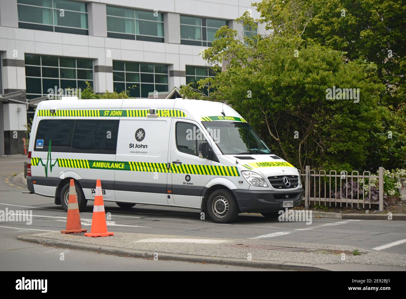CHRISTCHURCH, NEW ZEALAND, DECEMBER 30, 2020; A white St John ambulance leaves Christchurch hospital, December 30, 2020 Stock Photo