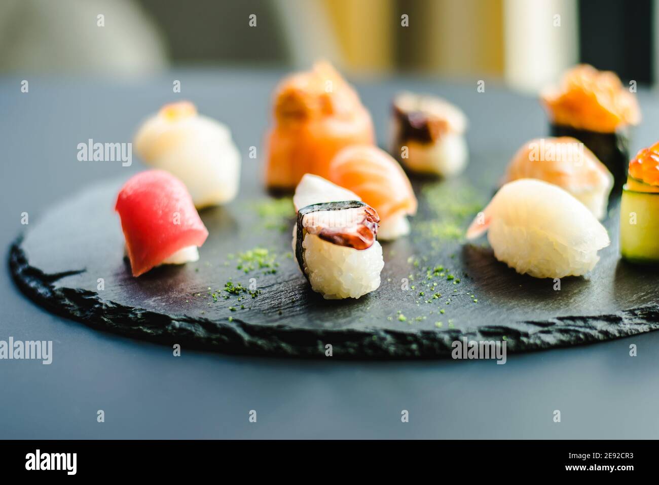 maki-and-nigiri-sushi-variety-with-salmon-shrimp-avocado-and-tuna-at