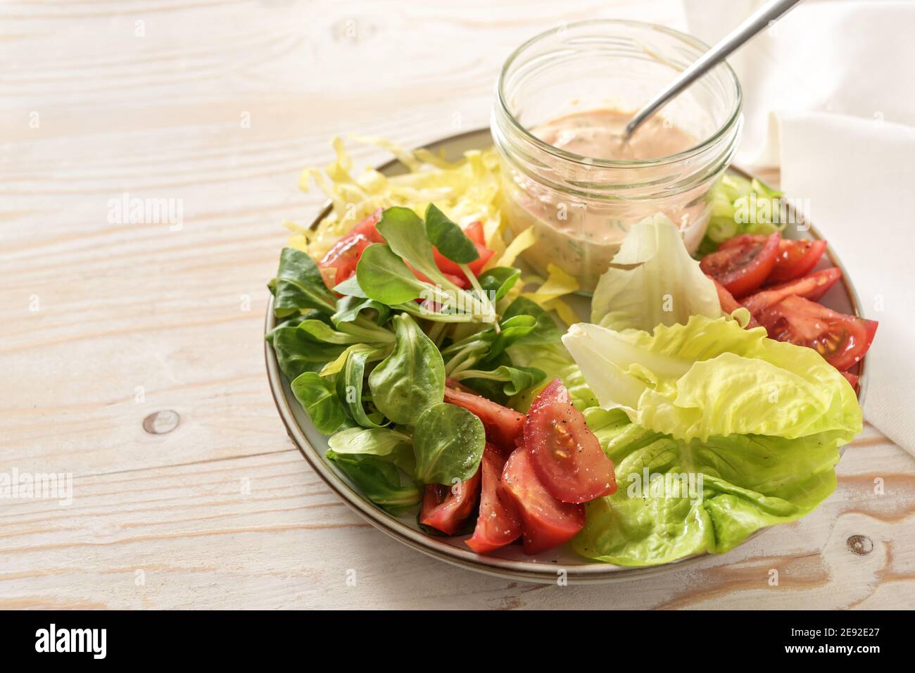Thousand island dressing on salad hires stock photography and images Alamy