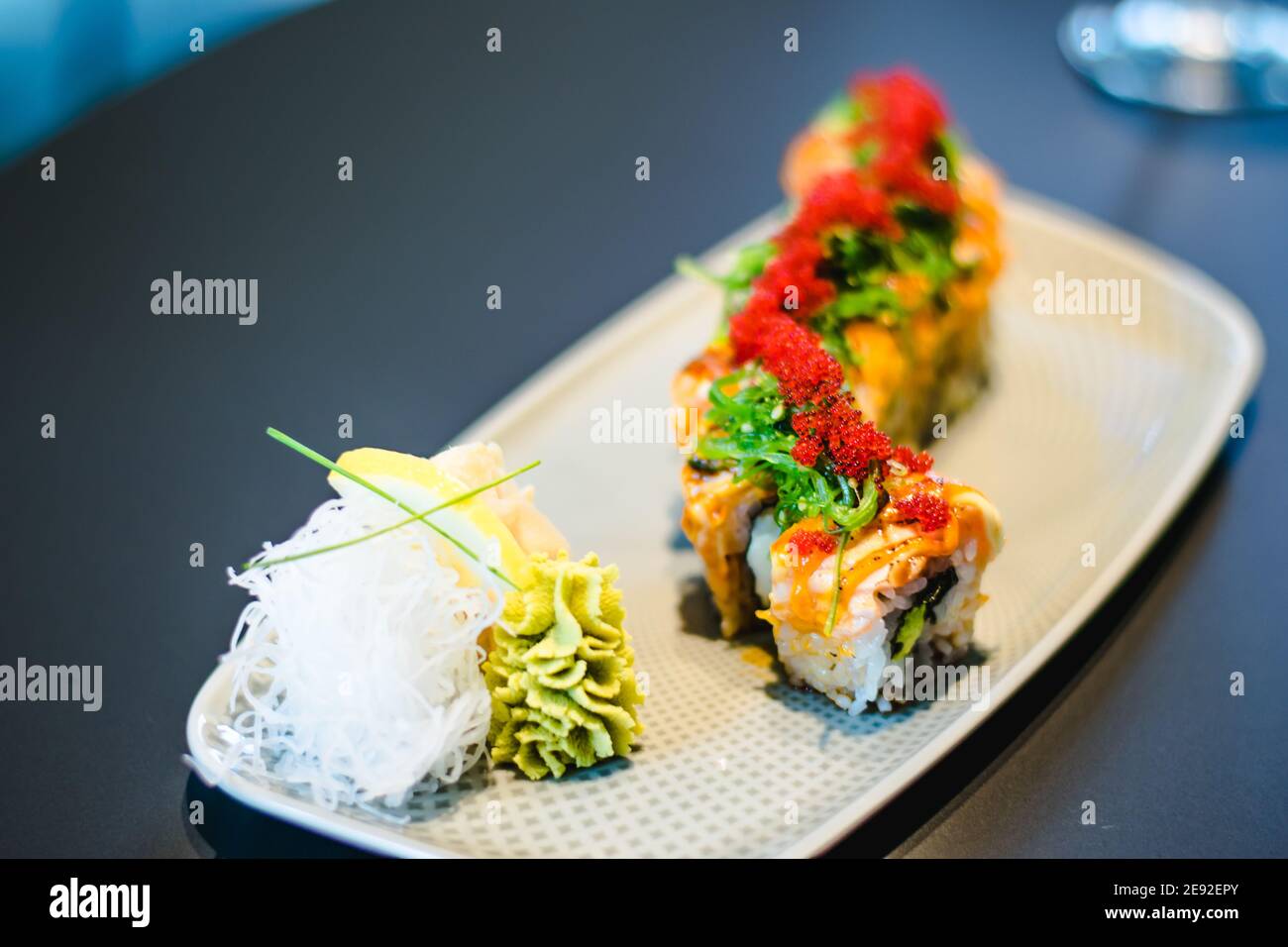maki-and-nigiri-sushi-variety-with-salmon-shrimp-avocado-and-tuna-at