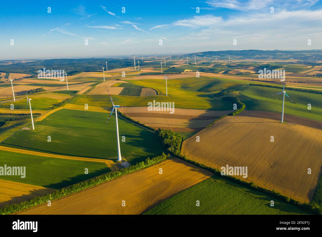 Wind turbine from aerial view - Sustainable development, environment friendly, renewable energy concept.Landscape with modern wind turbines in Austria Stock Photo