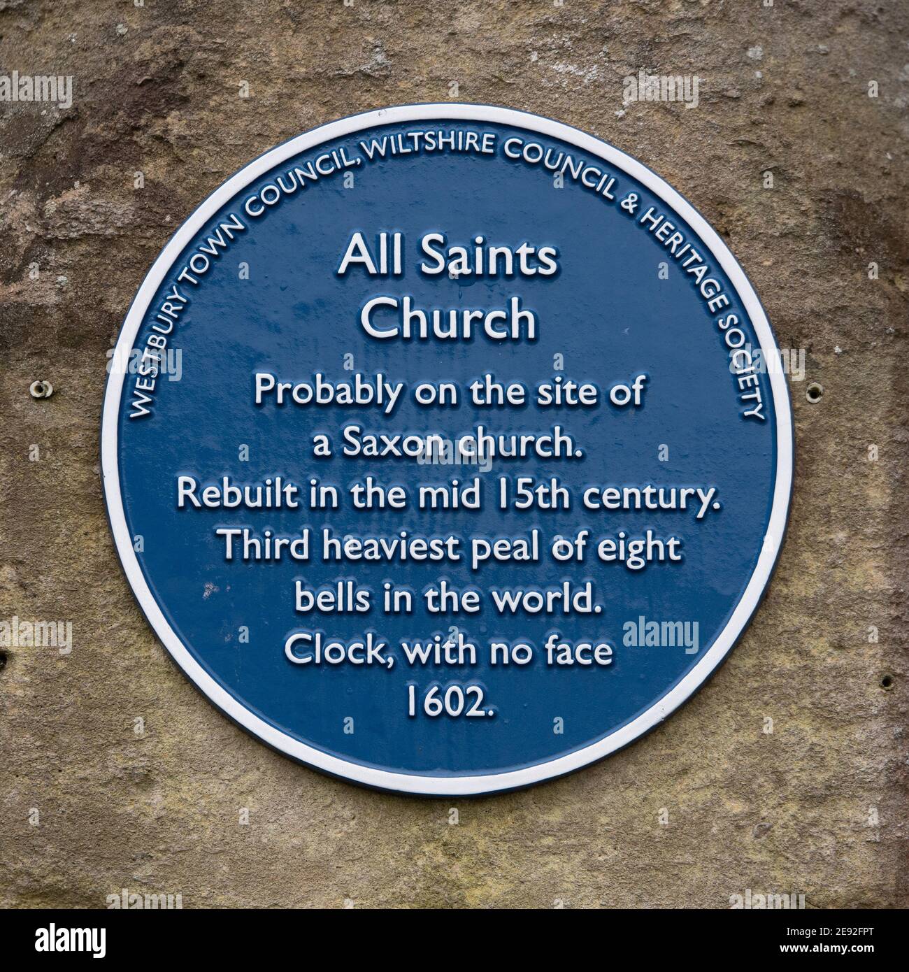 Local (Westbury, Wiltshire) blue plaque marking All Saints Church, probably on the site of a Saxon church. Stock Photo