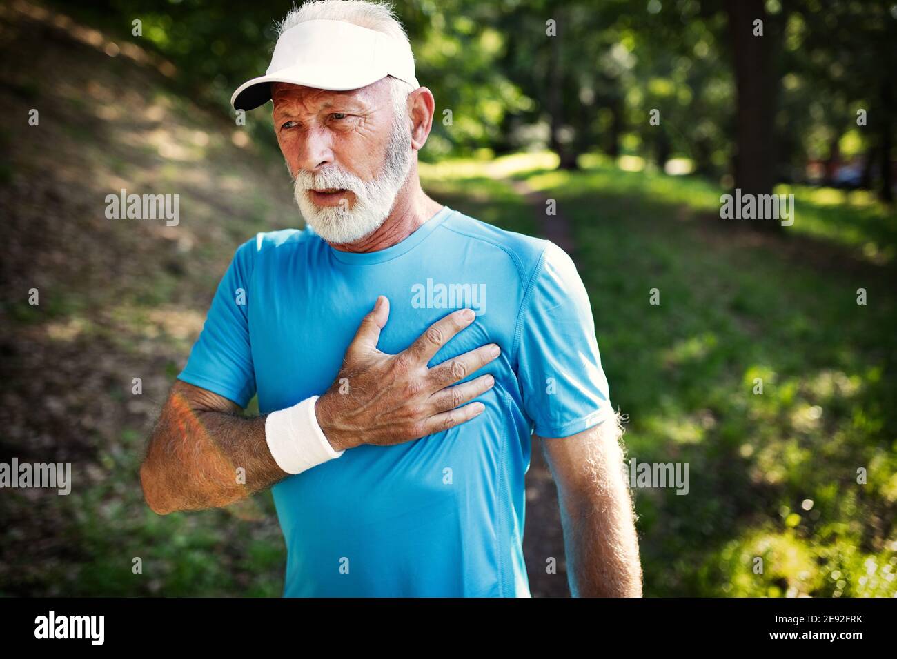 Older man heart attack after running workout outdoor Stock Photo Alamy