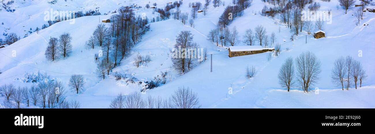 Pasiegas cabins in winter in the Valle del Miera in the Valles Pasiegos