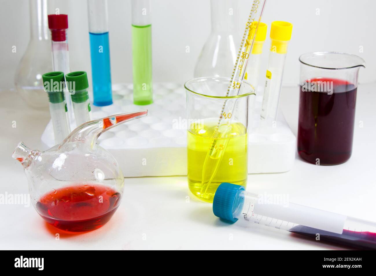 View of colorful laboratory chemical liquid elements on styrofoam test