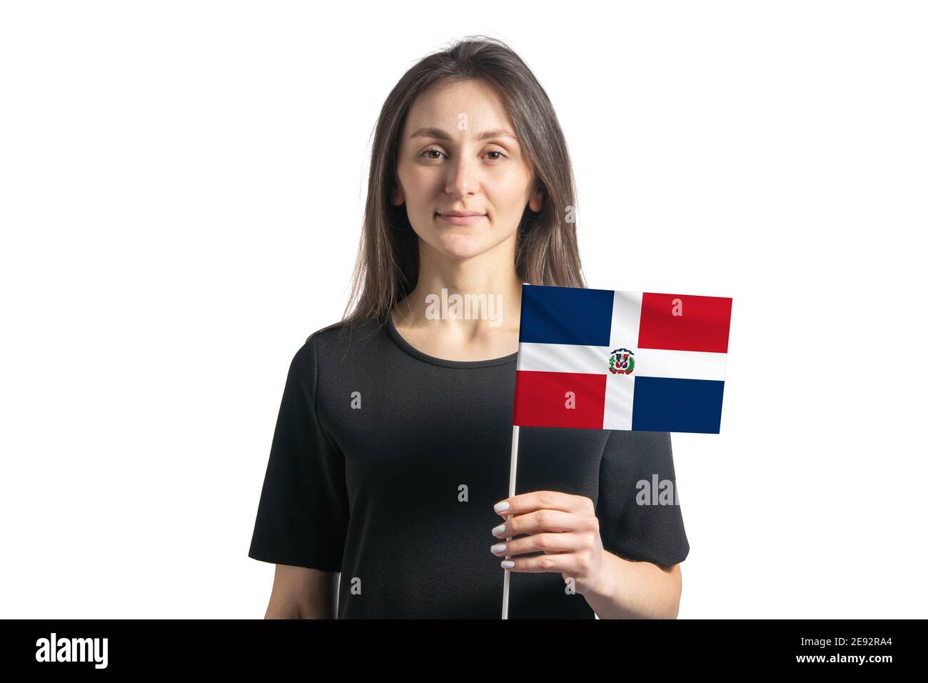 Happy young white girl holding Dominican Republic flag isolated on a
