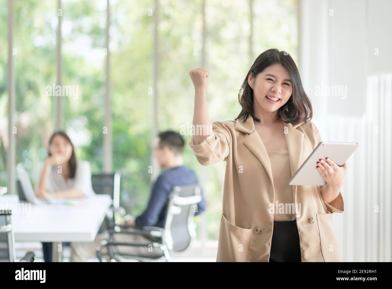Business employee enjoy and happy to work at company office with positive attitude. Stock Photo