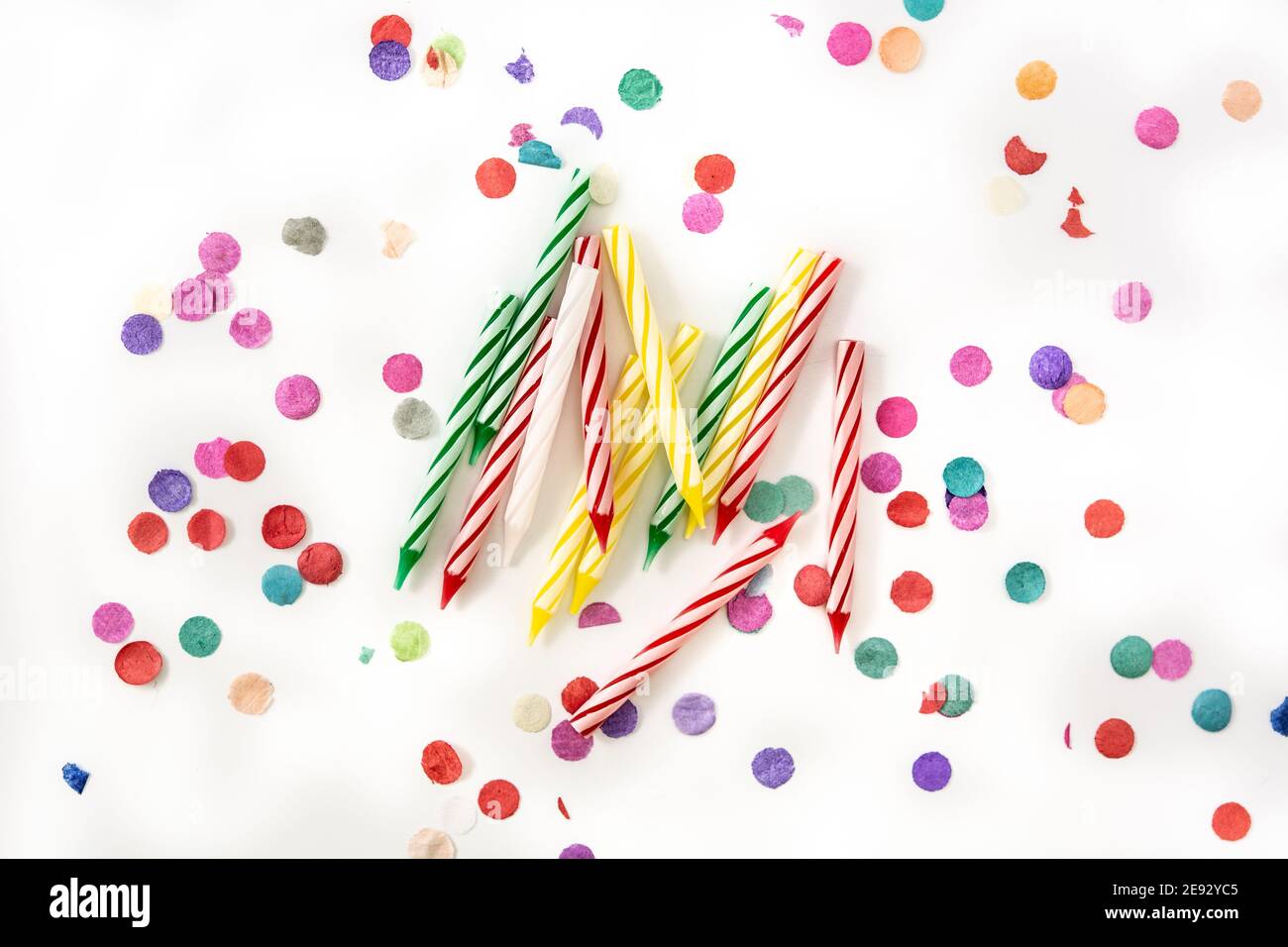 Colorful birthday candles isolated on white background Stock Photo - Alamy