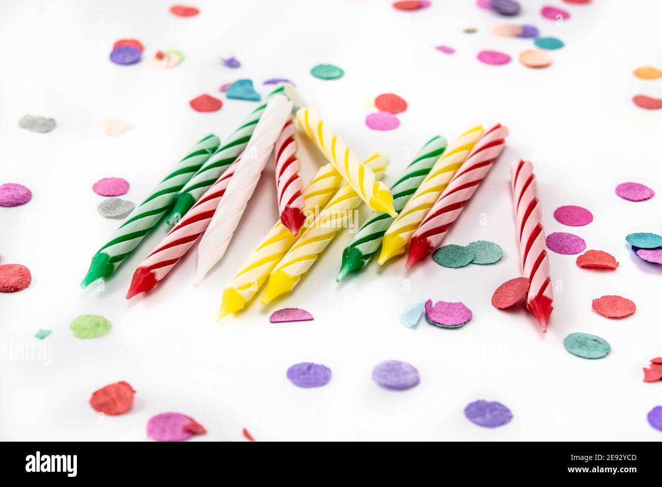 Colorful birthday candles isolated on white background Stock Photo - Alamy